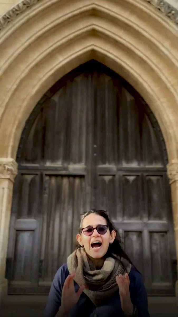 Munzereen Shahid at an Oxford doorway in a vertical reel